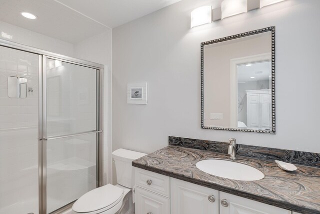 10 Shiverick Rd, East Dennis, MA 02641 - full bathroom with vanity, a stall shower, and recessed lighting