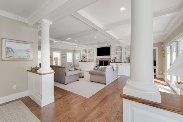 10 Shiverick Rd, East Dennis, MA 02641 - living area with ornate columns, light wood-style flooring, coffered ceiling, beamed ceiling, and ornamental molding