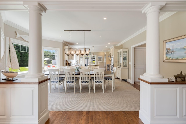 10 Shiverick Rd, East Dennis, MA 02641 - dining space with decorative columns, ornamental molding, wood finished floors, and recessed lighting