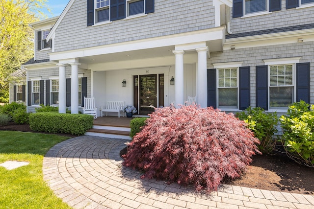 10 Shiverick Rd, East Dennis, MA 02641 - doorway to property with a porch