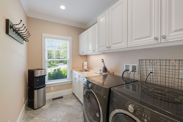 10 Shiverick Rd, East Dennis, MA 02641 - washroom featuring washing machine and clothes dryer, cabinet space, and ornamental molding