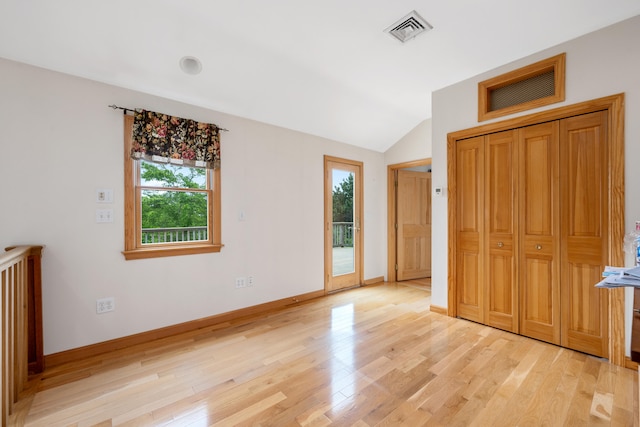 9 Priest Rd, Truro, MA 02666 - unfurnished bedroom featuring access to outside, light wood finished floors, and lofted ceiling