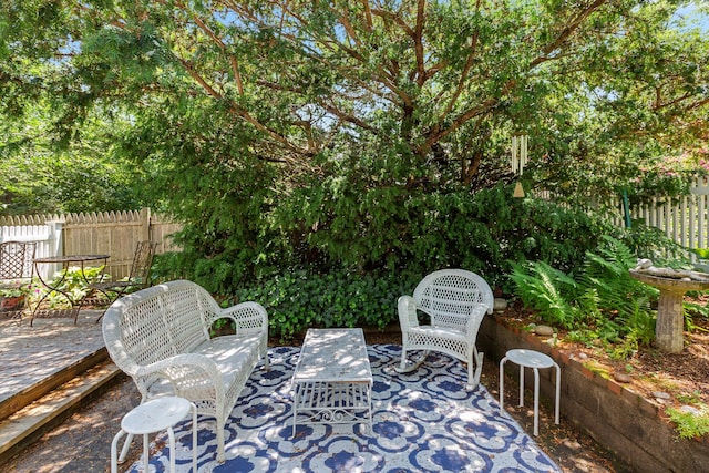 1205 Massasoit Rd, Eastham, MA 02642 - view of patio / terrace with view of wooded area