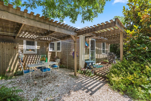 1205 Massasoit Rd, Eastham, MA 02642 - view of patio featuring a pergola, grilling area, and outdoor dining area