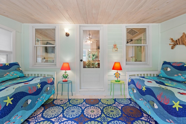 1205 Massasoit Rd, Eastham, MA 02642 - bedroom featuring tile patterned floors and wood ceiling