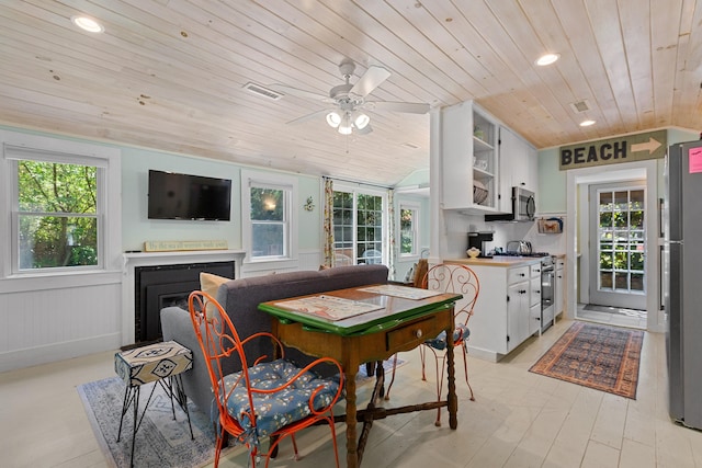 1205 Massasoit Rd, Eastham, MA 02642 - dining area featuring wooden ceiling, lofted ceiling, healthy amount of natural light, ceiling fan, and recessed lighting