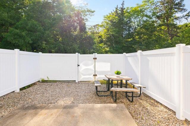 63 Pine Valley Dr Unit 63Aka 30A, Falmouth, MA 02540 - fenced backyard featuring a patio area and a gate