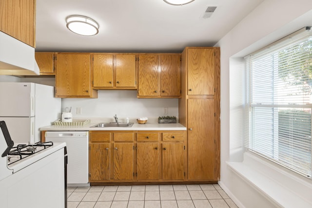 63 Pine Valley Dr Unit 63Aka 30A, Falmouth, MA 02540 - kitchen with white appliances, light countertops, light tile patterned flooring, and brown cabinetry