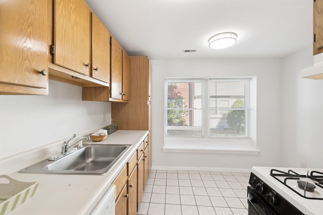 63 Pine Valley Dr Unit 63Aka 30A, Falmouth, MA 02540 - kitchen featuring light countertops, light tile patterned floors, brown cabinets, and white dishwasher