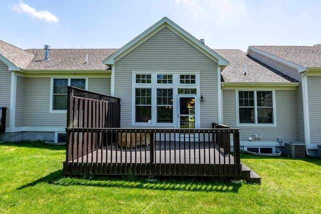 45 Grey Hawk Dr Unit 578, Mashpee, MA 02649 - back of property featuring cooling unit, a lawn, a shingled roof, and a wooden deck