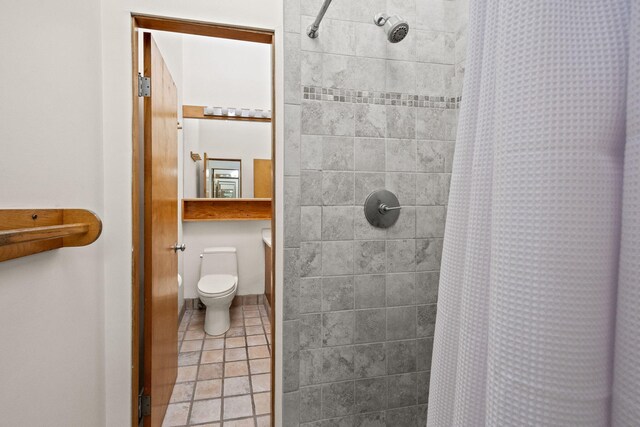 47 Fishermans Rd, Truro, MA 02666 - bathroom with tiled shower and tile patterned floors
