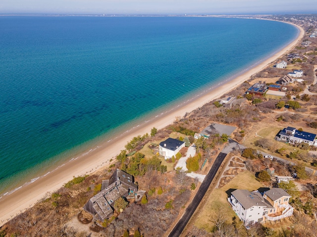 bird's eye view with a water view and a view of the beach