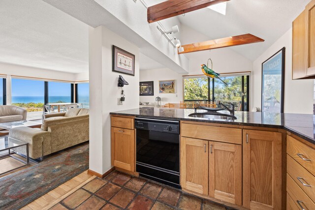 47 Fishermans Rd, Truro, MA 02666 - kitchen featuring black dishwasher, open floor plan, dark stone counters, a peninsula, and a water view