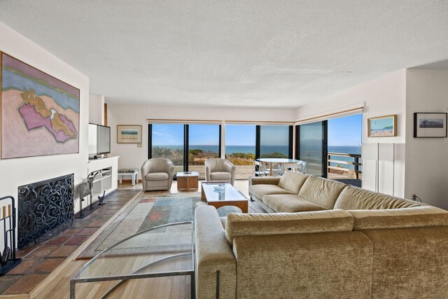 47 Fishermans Rd, Truro, MA 02666 - living room with a textured ceiling and dark wood finished floors