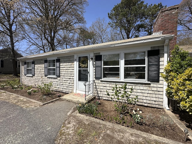 view of front of house with a chimney