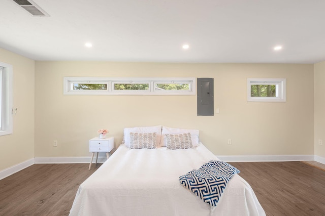 20 Terry Ln E, Wareham, MA 02571 - bedroom featuring wood finished floors, electric panel, multiple windows, and recessed lighting