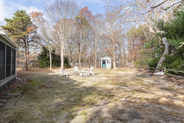 view of yard with a storage unit