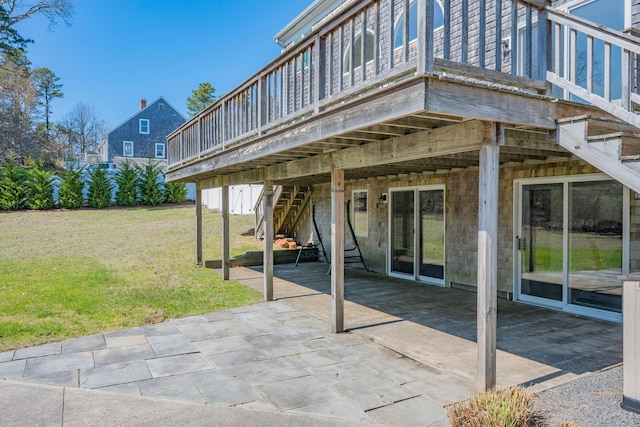 view of patio / terrace featuring stairs and a deck