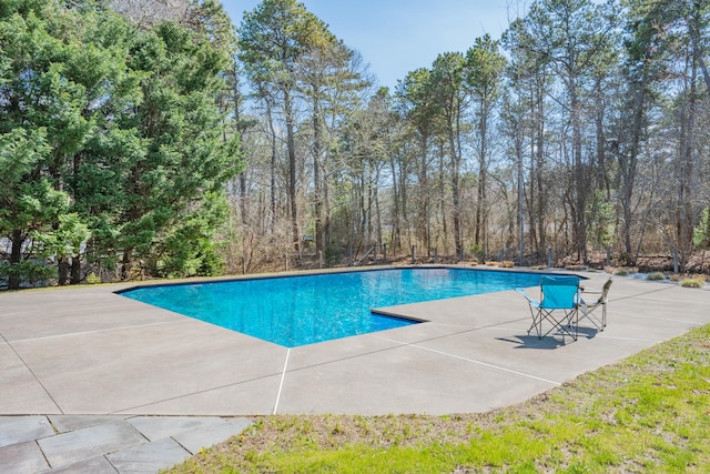 outdoor pool with a patio
