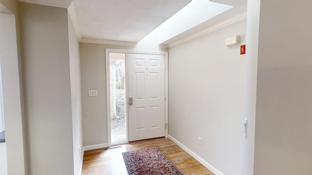 23 W Woods Vlg, Yarmouth Port, MA 02675 - entryway with light wood-type flooring and crown molding