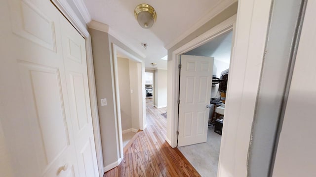 23 W Woods Vlg, Yarmouth Port, MA 02675 - hall with light wood-style floors and crown molding