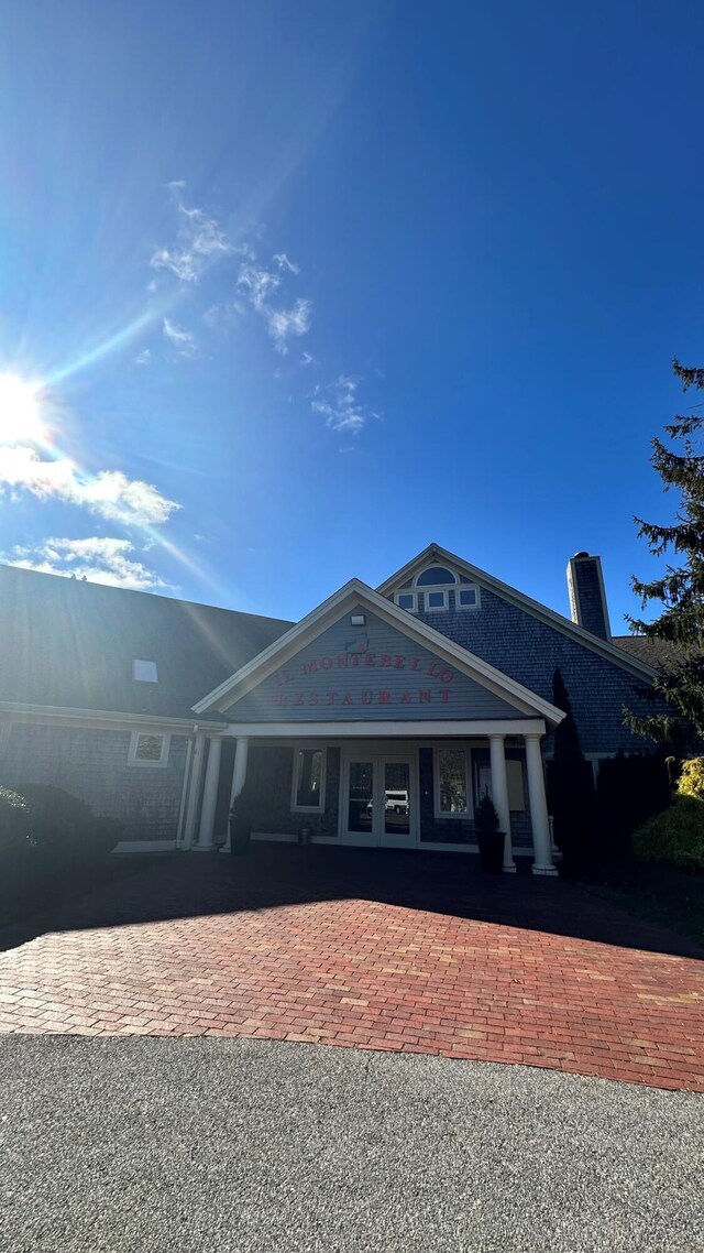 23 W Woods Vlg, Yarmouth Port, MA 02675 - greek revival house with a chimney