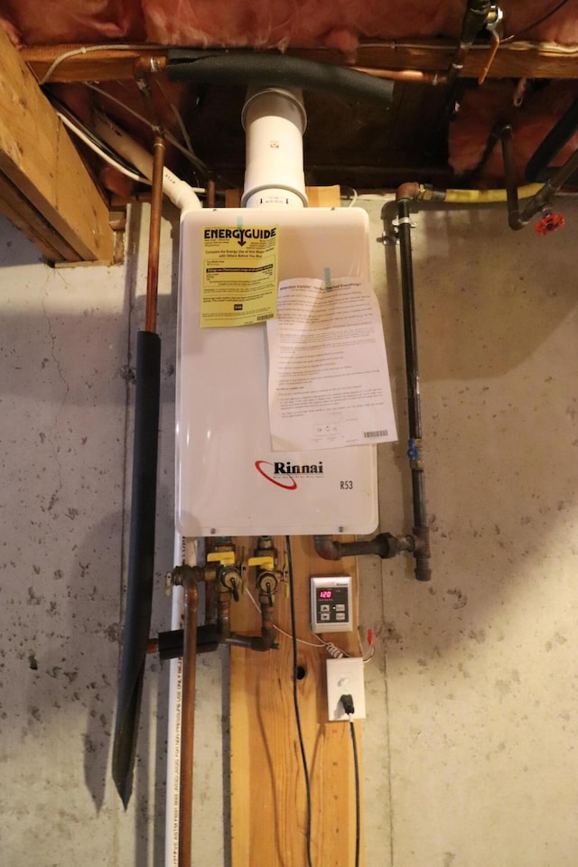 23 W Woods Vlg, Yarmouth Port, MA 02675 - utility room featuring tankless water heater