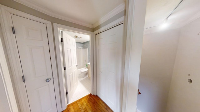 23 W Woods Vlg, Yarmouth Port, MA 02675 - hallway featuring crown molding and light wood-style flooring
