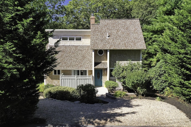 41 Halyard Ln, Mashpee, MA 02649 - view of front of house with a shingled roof and a chimney