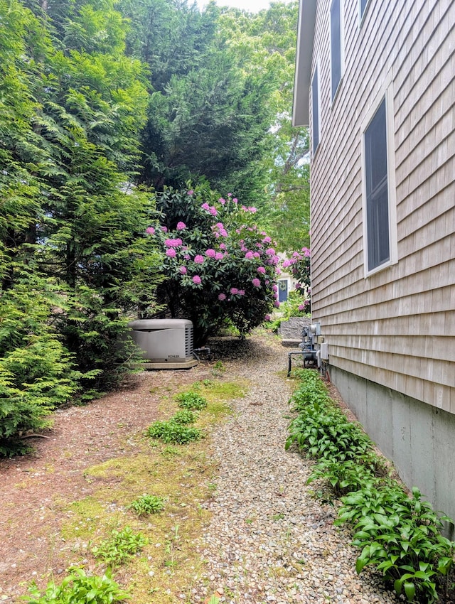 41 Halyard Ln, Mashpee, MA 02649 - view of yard featuring a wooded view
