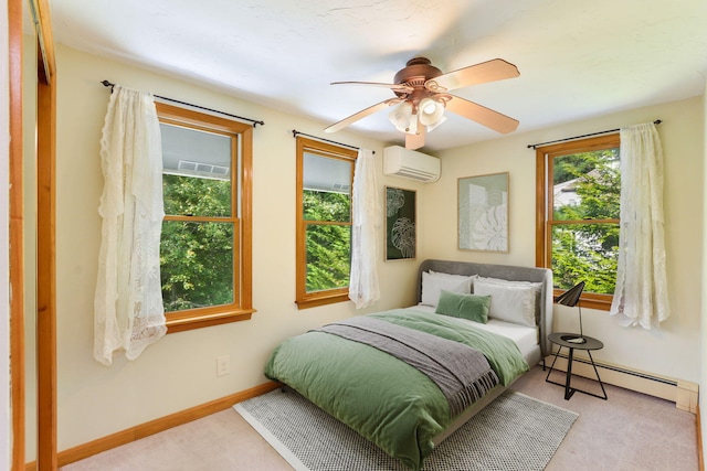 41 Halyard Ln, Mashpee, MA 02649 - bedroom with a baseboard heating unit, a wall unit AC, multiple windows, and ceiling fan