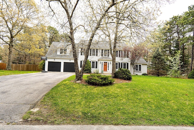 57 Camden Ln, Mashpee, MA 02649 - colonial home with asphalt driveway