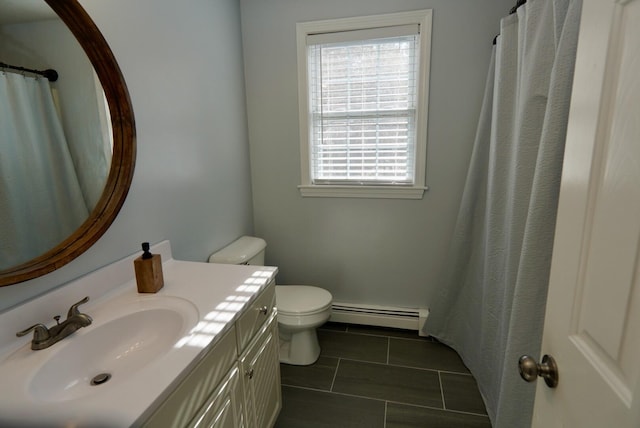 57 Camden Ln, Mashpee, MA 02649 - bathroom featuring a baseboard radiator, toilet, vanity, tile patterned flooring, and a shower with shower curtain