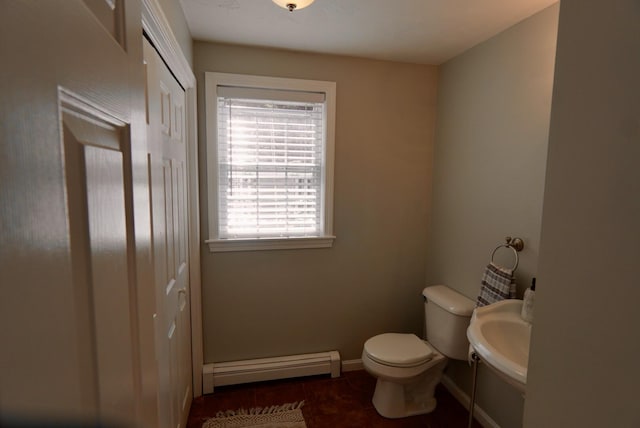57 Camden Ln, Mashpee, MA 02649 - bathroom with baseboard heating, toilet, tile patterned flooring, and baseboards