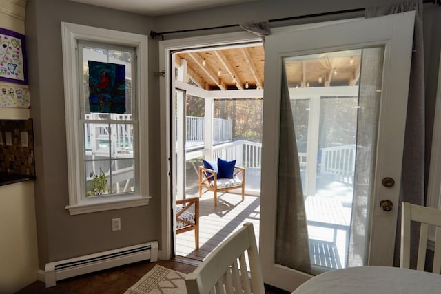57 Camden Ln, Mashpee, MA 02649 - doorway to outside with a baseboard radiator