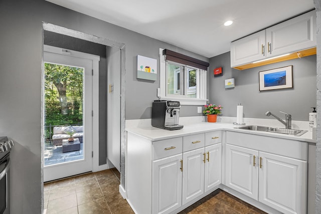4 Bradford Acres Rd Unit F, Provincetown, MA 02657 - kitchen with plenty of natural light, white cabinetry, light countertops, and recessed lighting