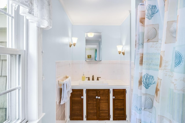 127 Short Beach Rd, Centerville, MA 02632 - full bath with ornamental molding, vanity, tile walls, and curtained shower