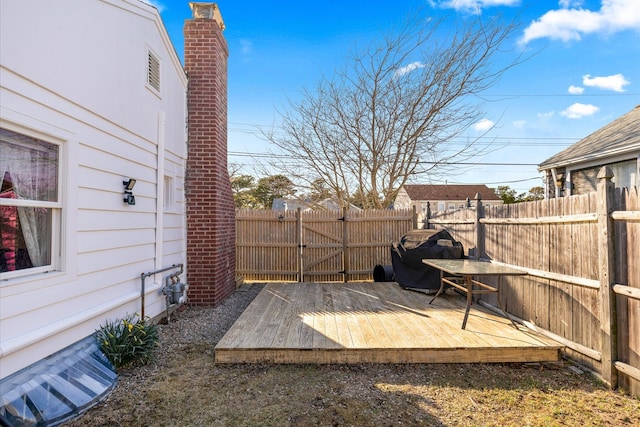 188 Captain Chase Rd, Dennis Port, MA 02639 - view of yard featuring a fenced backyard, a wooden deck, and a gate