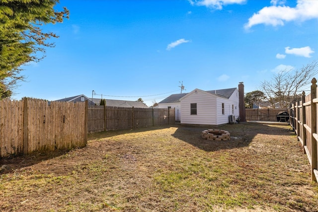 188 Captain Chase Rd, Dennis Port, MA 02639 - view of yard featuring a fenced backyard and a fire pit