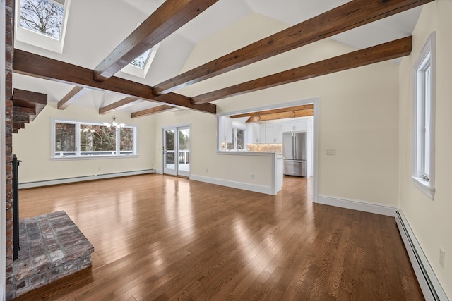 507 S Orleans Rd, Orleans, MA 02653 - unfurnished living room with a baseboard radiator, a skylight, a chandelier, wood finished floors, and beamed ceiling