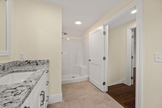 507 S Orleans Rd, Orleans, MA 02653 - full bathroom featuring a shower stall, vanity, and baseboards