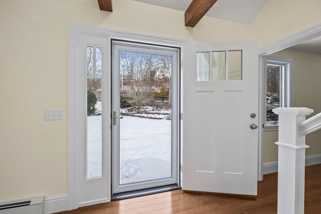 507 S Orleans Rd, Orleans, MA 02653 - foyer entrance with a baseboard radiator, wood finished floors, and beamed ceiling