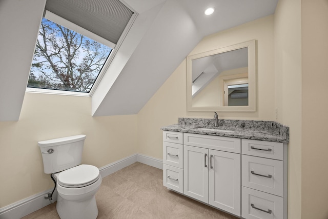 507 S Orleans Rd, Orleans, MA 02653 - half bathroom with baseboards, toilet, vanity, lofted ceiling, and recessed lighting