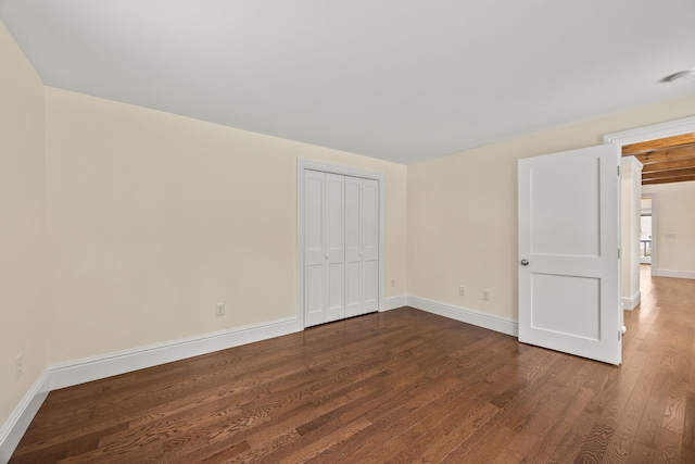 507 S Orleans Rd, Orleans, MA 02653 - unfurnished bedroom with wood finished floors, baseboards, and a closet