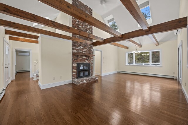 507 S Orleans Rd, Orleans, MA 02653 - unfurnished living room with baseboard heating, a chandelier, a wall mounted AC, and wood finished floors
