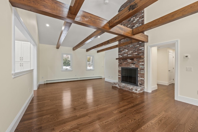 507 S Orleans Rd, Orleans, MA 02653 - unfurnished living room featuring baseboard heating, beamed ceiling, wood finished floors, a brick fireplace, and baseboards