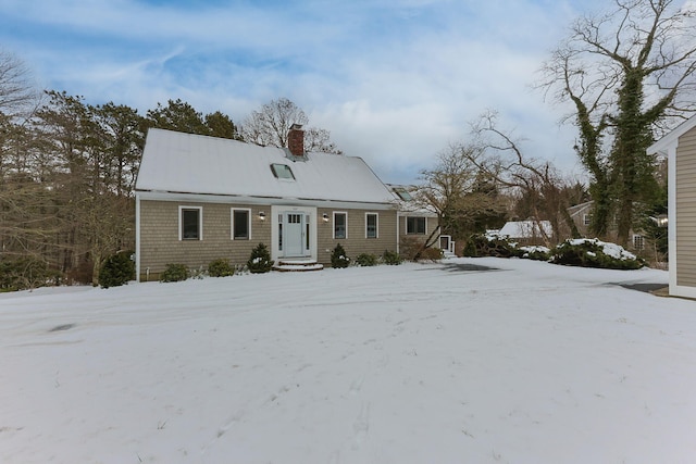 view of front of house with a chimney