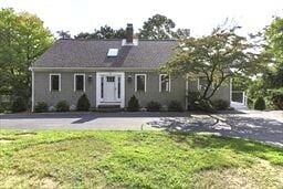507 S Orleans Rd, Orleans, MA 02653 - single story home featuring a front lawn and a chimney