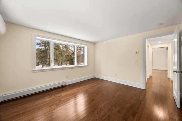 507 S Orleans Rd, Orleans, MA 02653 - empty room featuring a baseboard radiator, plenty of natural light, dark wood-style floors, and baseboards