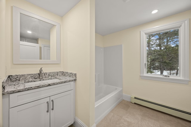507 S Orleans Rd, Orleans, MA 02653 - bathroom featuring a baseboard heating unit, vanity, baseboards, recessed lighting, and shower / bath combination